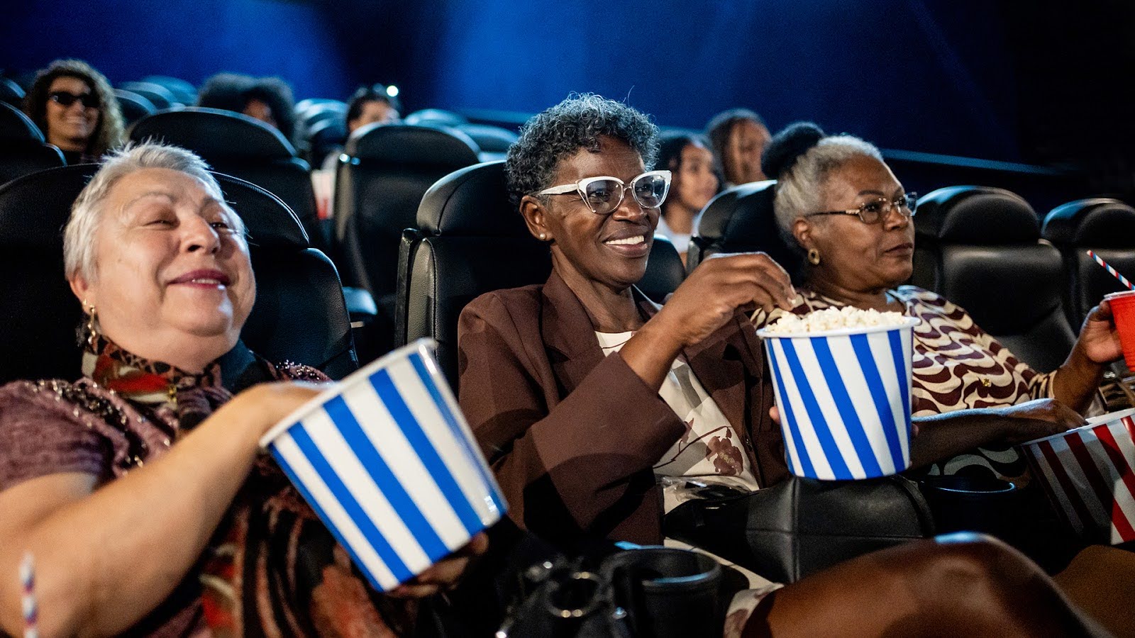 Group of happy senior women at the cinema