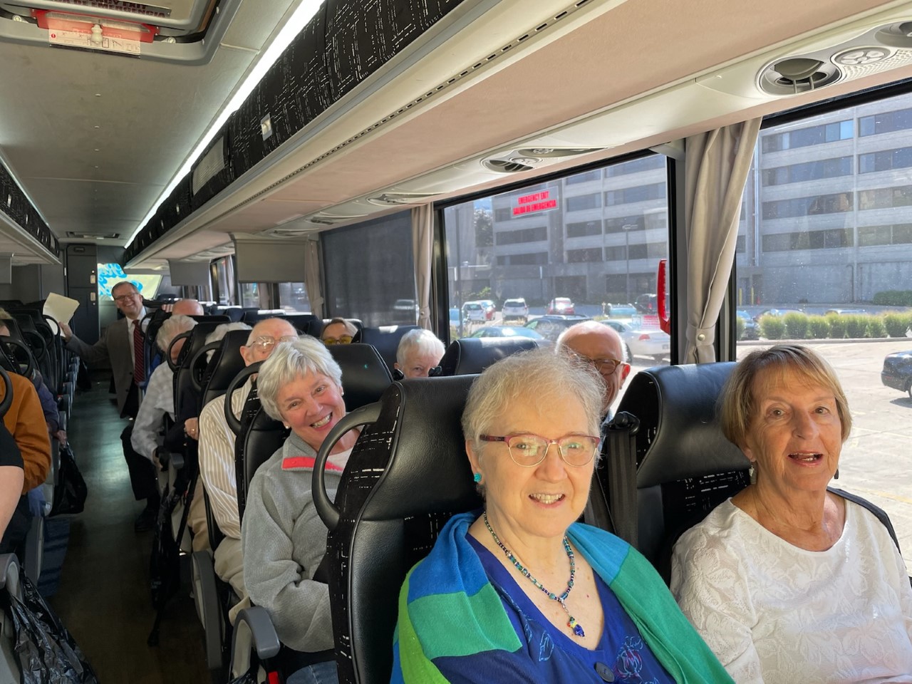 Group of seniors riding a bus